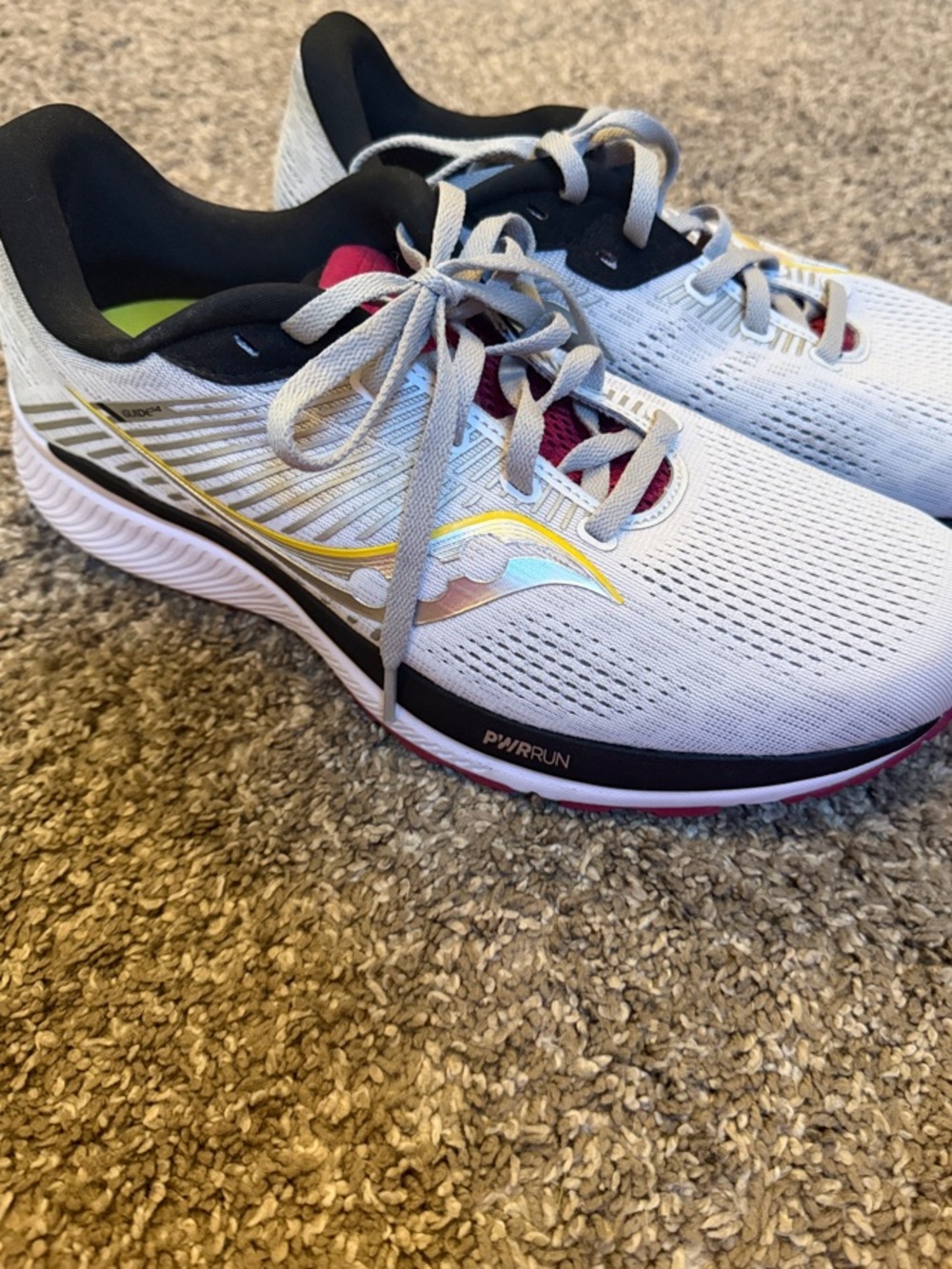 Saucony White Running Sneakers with Iridescent and Pink Accents